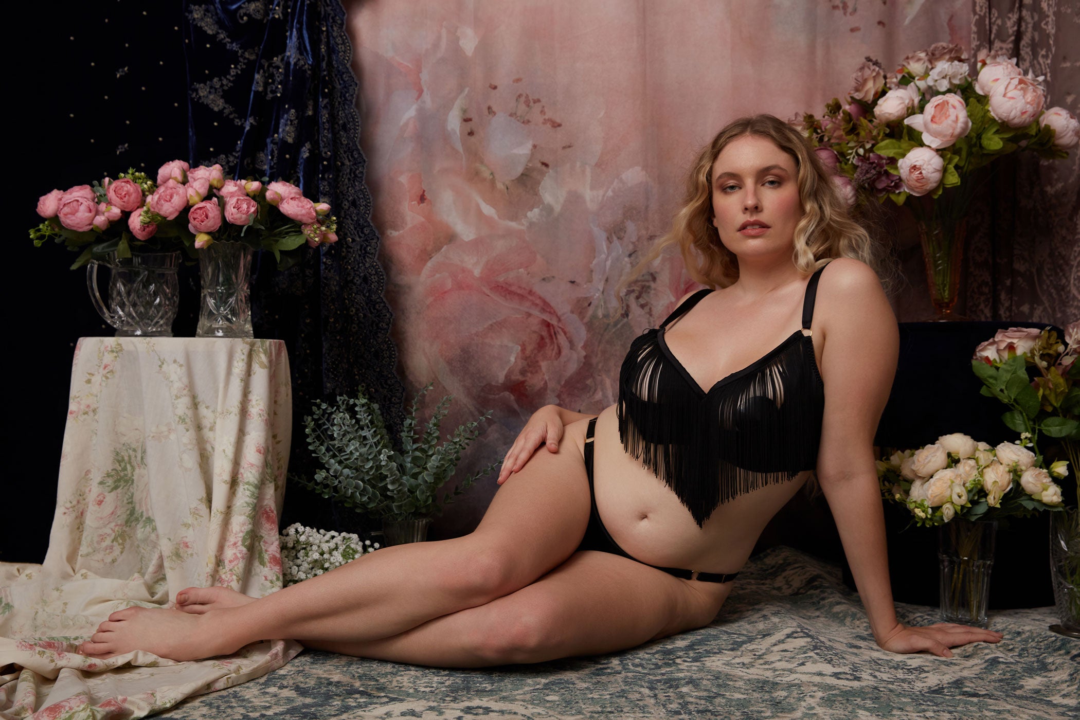 Fringed open cup bodoir bra set surrounded by flowers