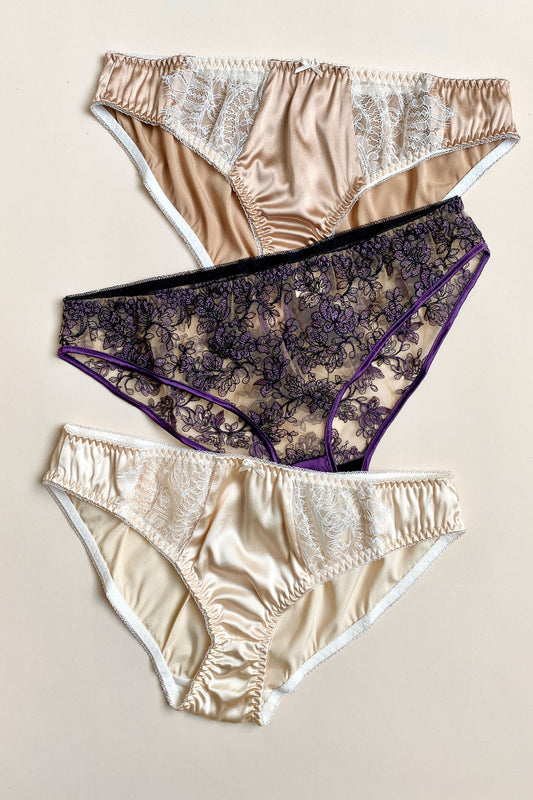 Set of 3 luxury panties in silk and sheer lace in shades of caramel, cream and purple