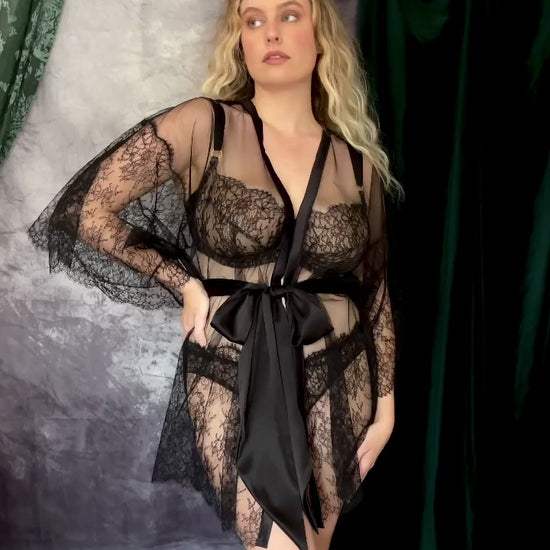 Video of black lace lingerie and robe