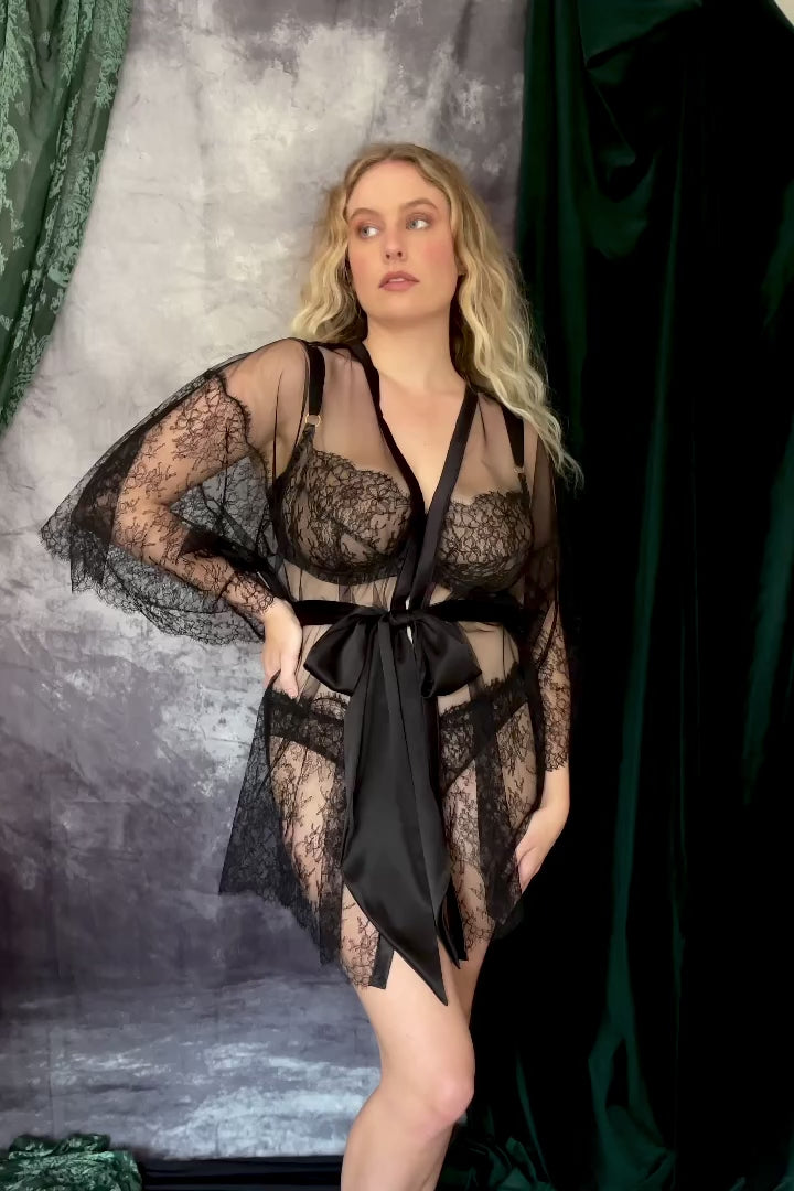 Video of black lace lingerie and robe