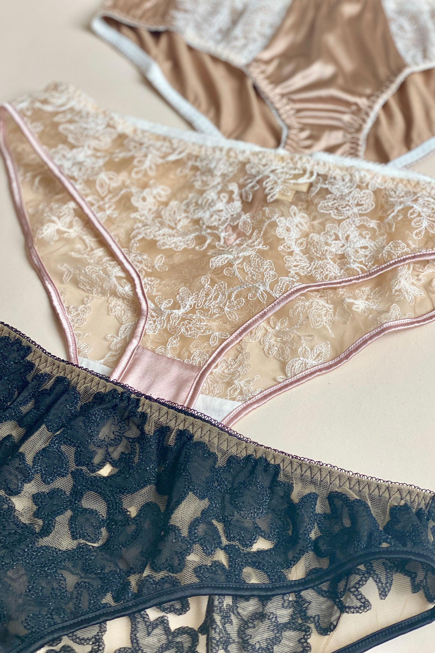 Closeup of sheer embroidery in luxury 3 knicker set