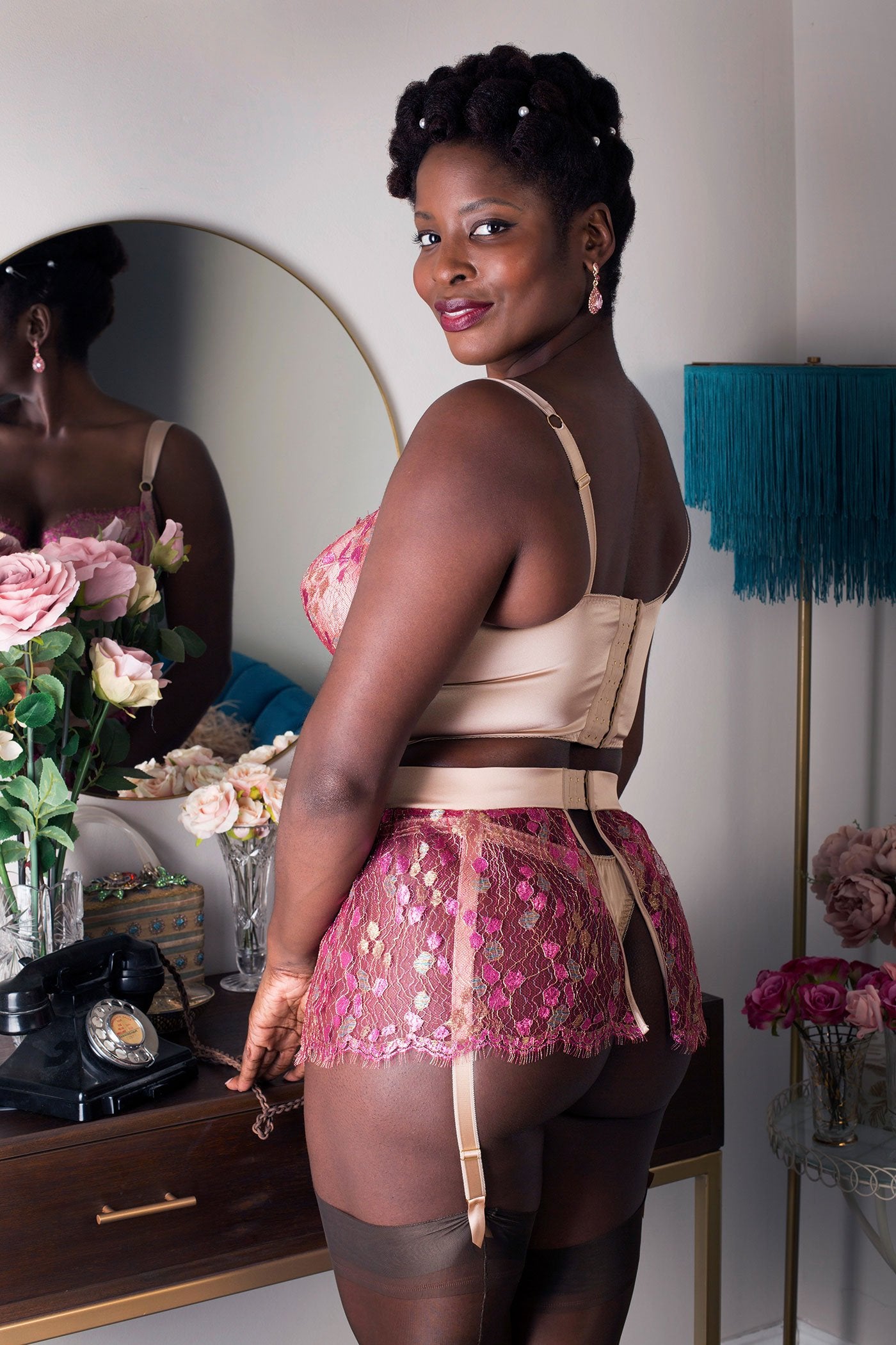 Luxury lingerie set with silk thong, skirted lace suspender and longline bra