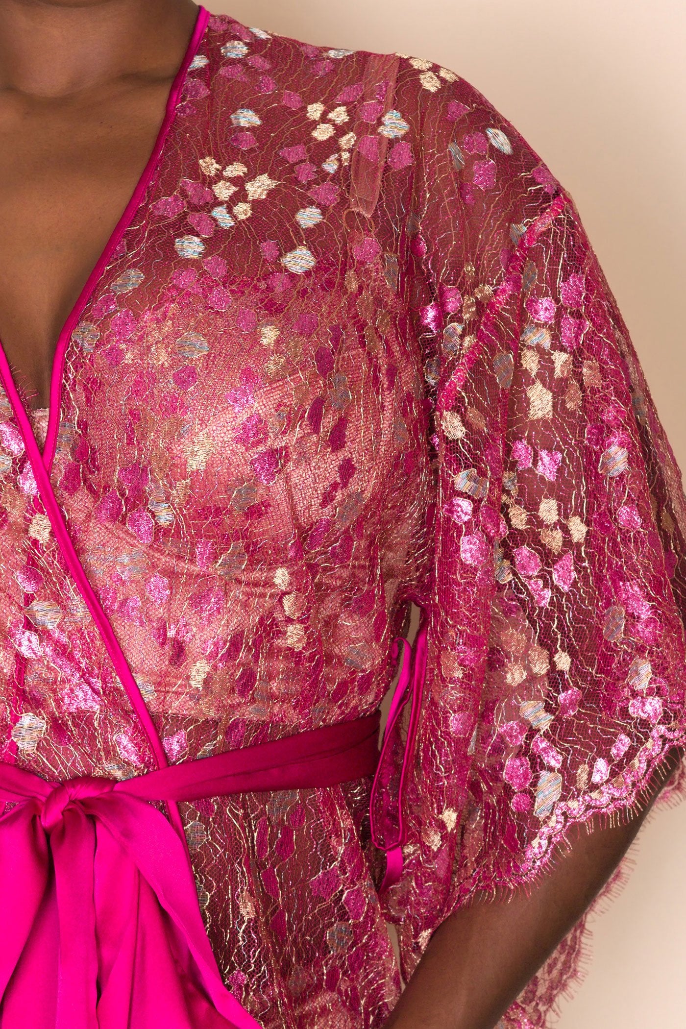 Lace sleeve detail on metallic pink sheer lace luxury dressing gown