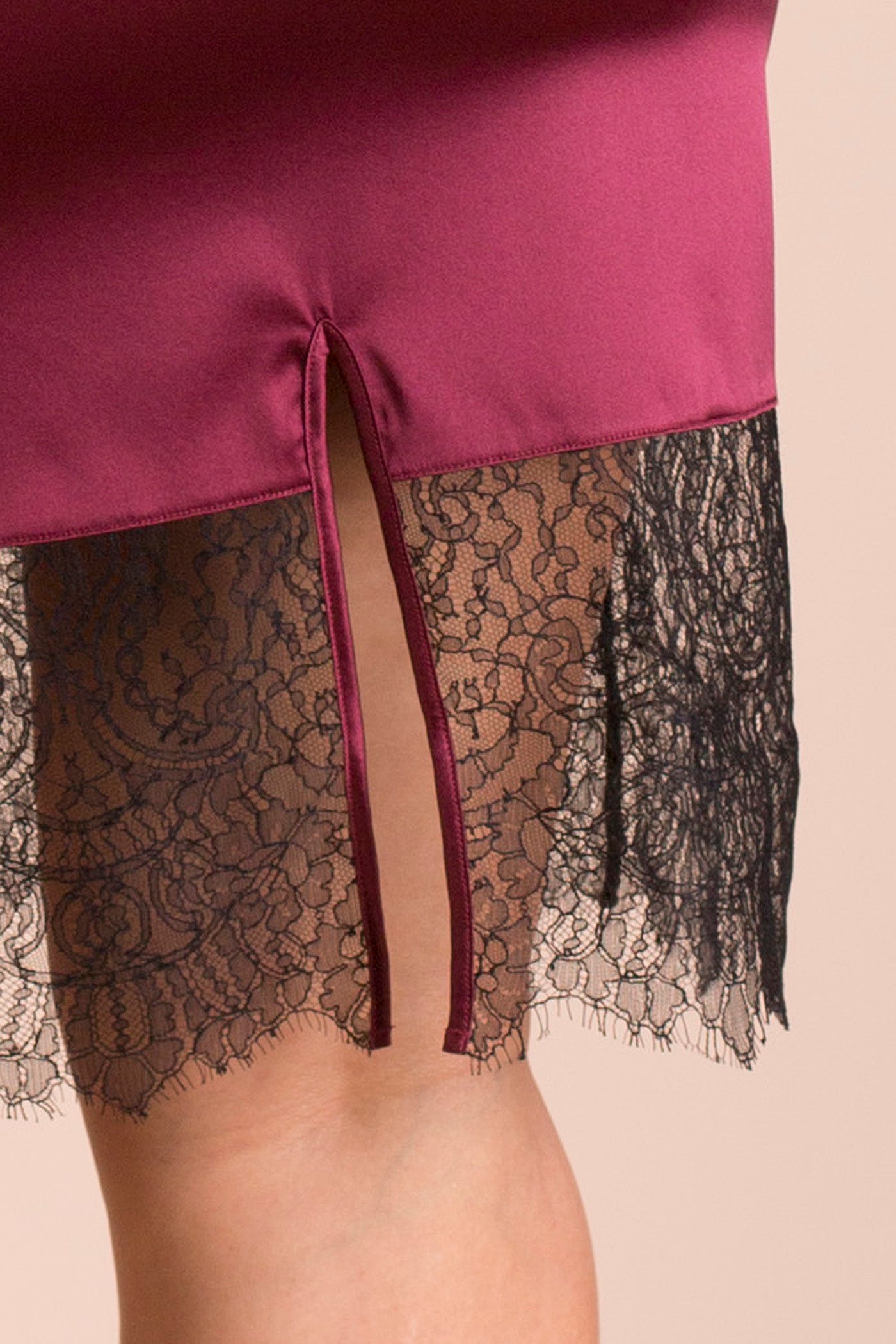 Lace detail on Eleanor Damson silk half slip, with silk binding on back split