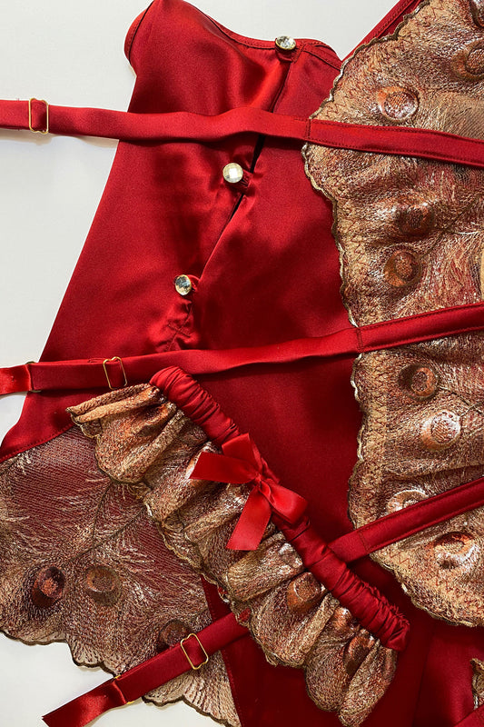 Red silk tap pants with crystal buttons, with gold peacock embroidery insert, paired with matching suspender belt and garter